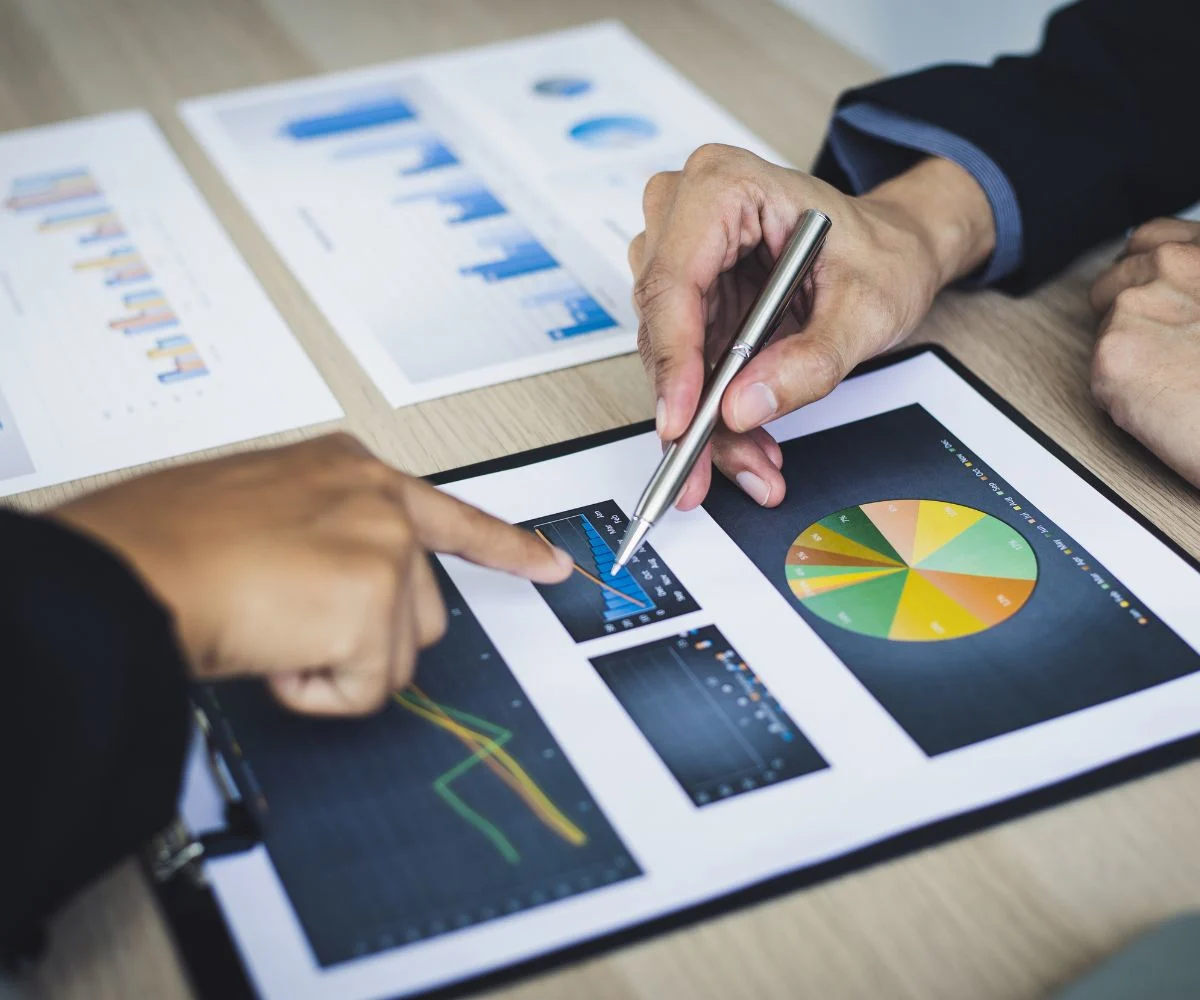 Operational cost review with a calculator and expense reports