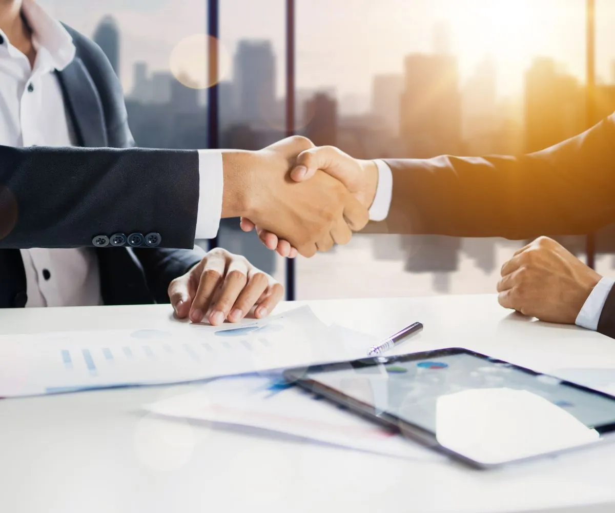 Founders reviewing company registration documents with a consultant